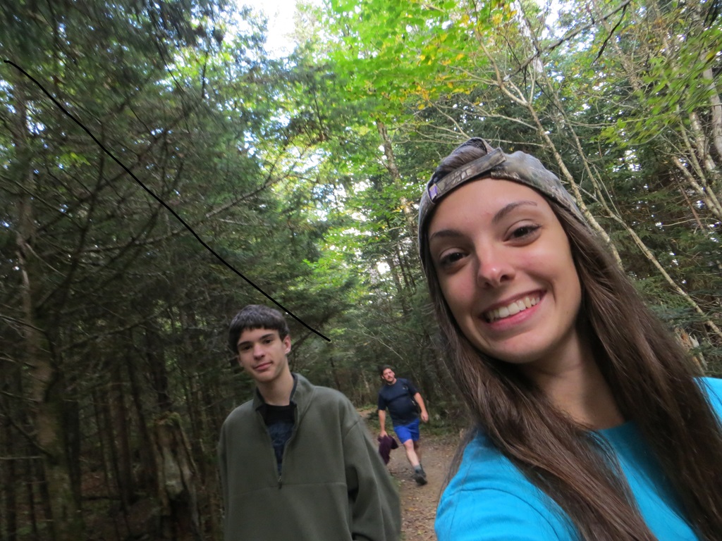 Family hiking along the trail to Andrews Bald in North Carolina.