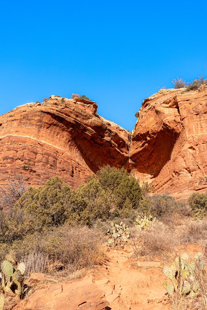 Birthing Cave seen from the outside and has a heart-shaped depression.