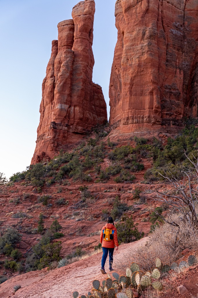 Woman hiking along the Cathedral Rock Trail in Sedona.