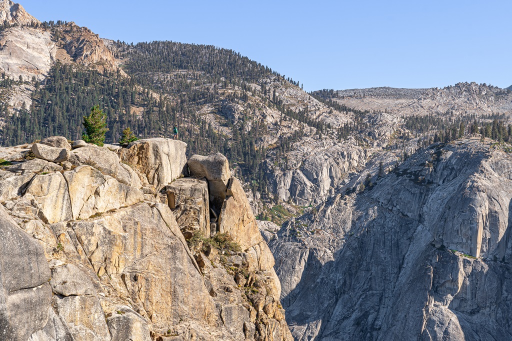 Man standing on top of the Watchtower along the Watchtower Trail in Sequoia National Park.