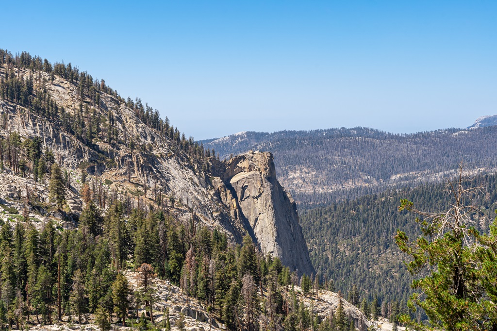 Distant view of The Watchtower from the Lakes Trail heading towards Pear Lake.