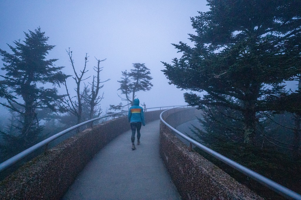 Woman walking to the top of the Kuwohi observation tower.