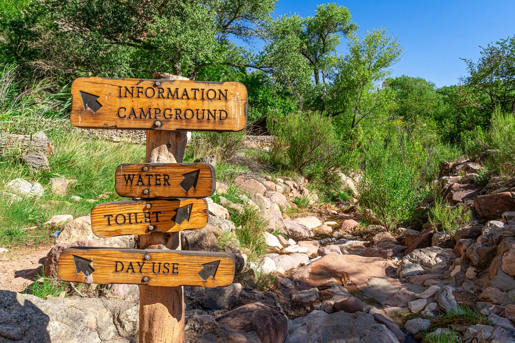 Sign at Havasupai Gardens indicating directions for information, campground, water, toilet, and day use area.