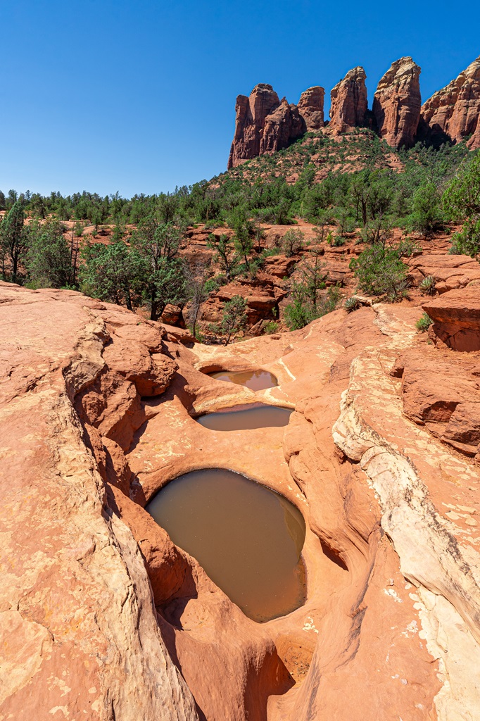 The Seven Sacred Pools with Coffee Pot Rock in the background.