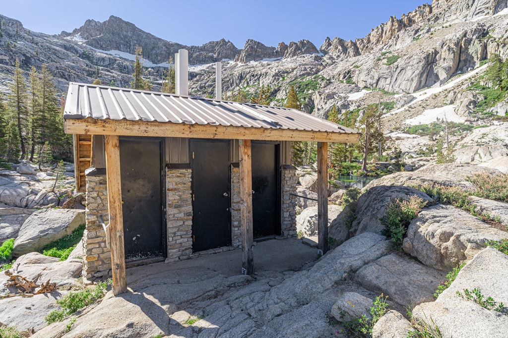 Pit toilets between Aster Lake and Emerald Lake along the Lakes Trail.