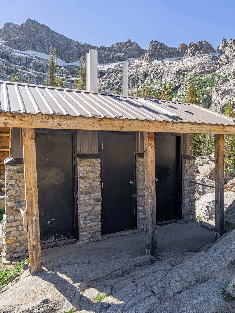 Pit toilets between Aster Lake and Emerald Lake along the Lakes Trail.