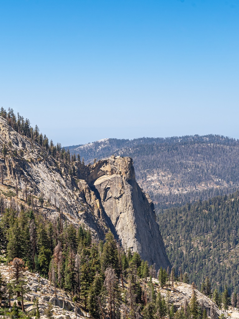 Distant view of The Watchtower from the Lakes Trail heading towards Pear Lake.