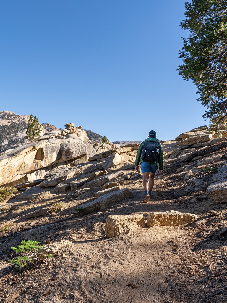 Man hiking along the Watchtower Trail in Sequoia National Park.