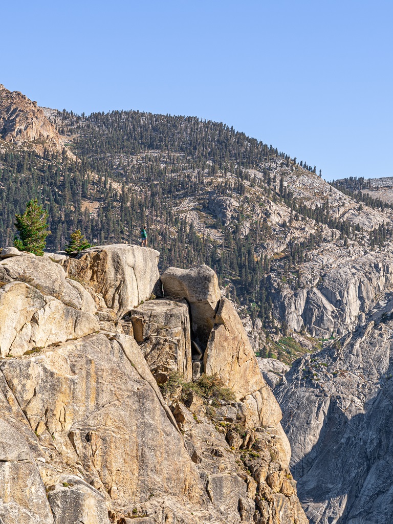 Man standing on top of the Watchtower along the Watchtower Trail in Sequoia National Park.