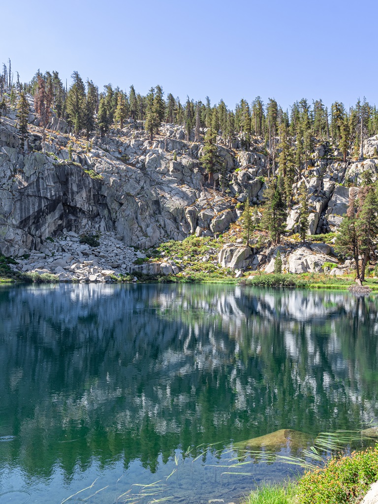 Turquoise alpine lake known as Heather Lake in Sequoia National Park.