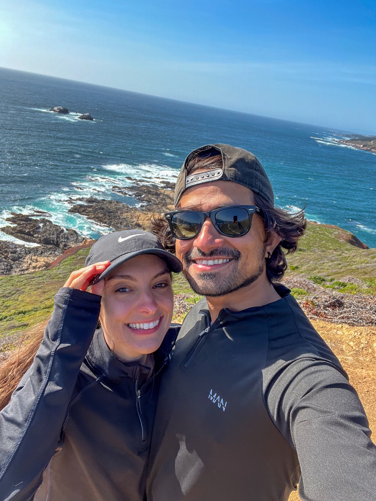 Man and woman taking a selfie on top of Whale Peak in Garrapata State Park.