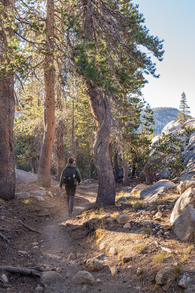 Man hiking along the Clouds Rest Trail in Yosemite National Park.