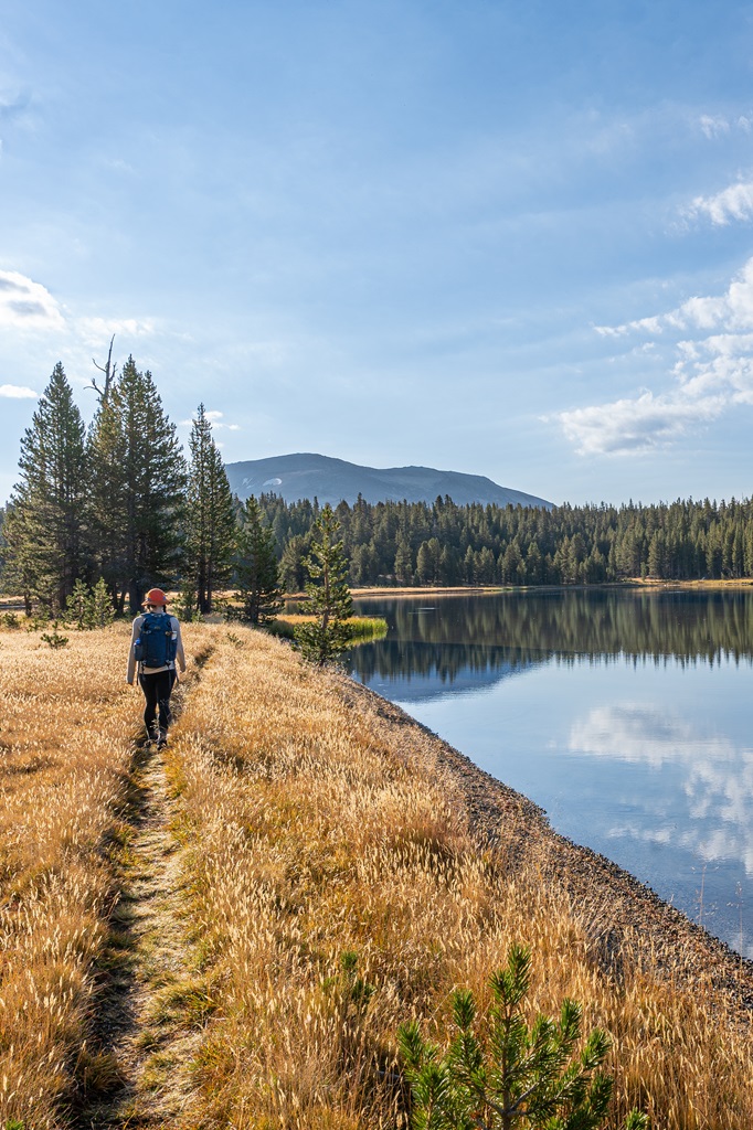 Woman hiking around Dog Lake in Yosemite National Park.