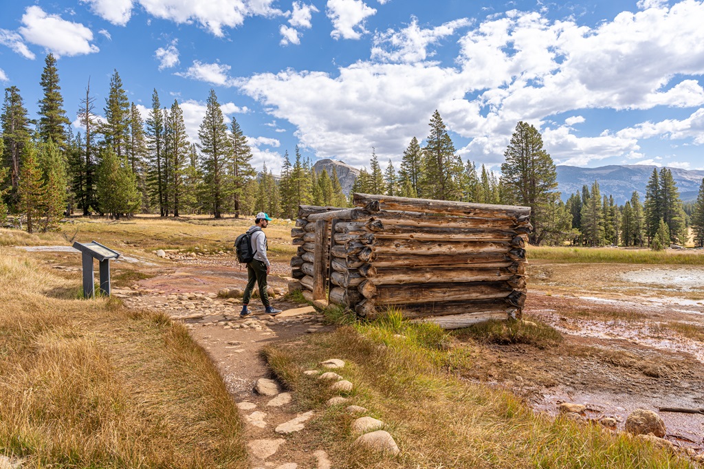 Man looking at the Soda Springs in Yosemite National Park.