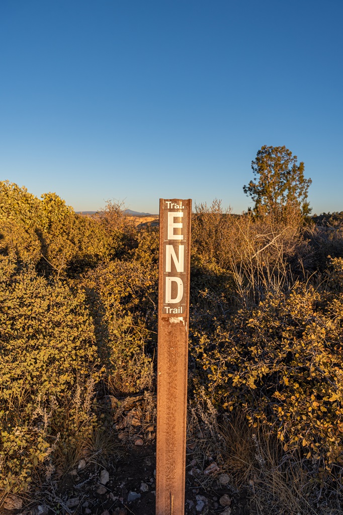 Trail End sign at the summit of Bear Mountain in Sedona.