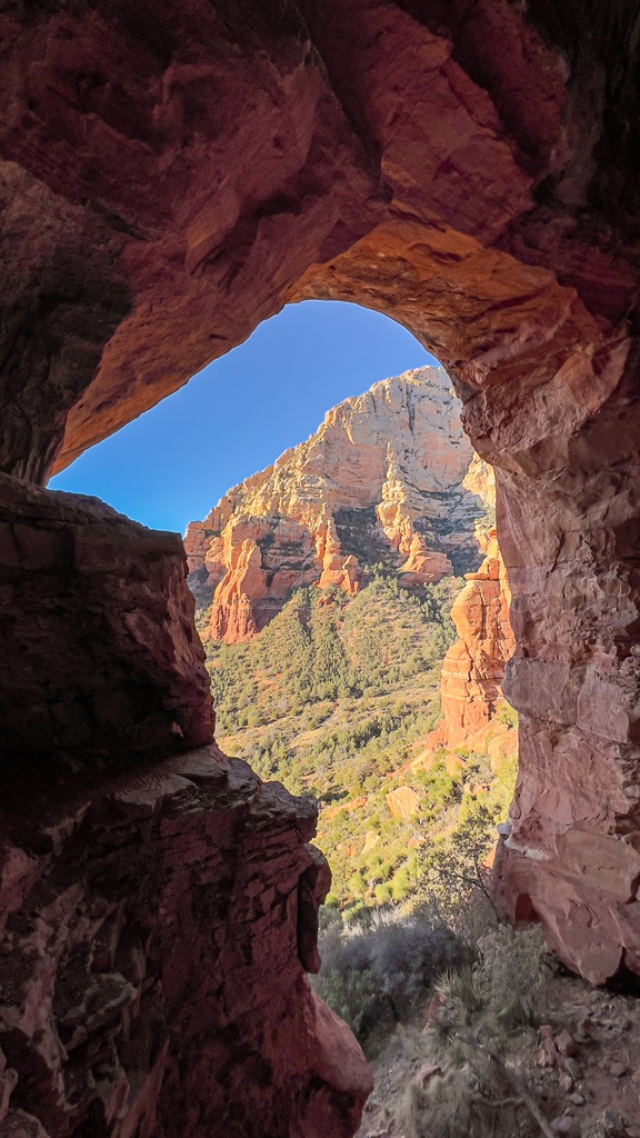 View of red rocks from inside the Keyhole Cave in Sedona.