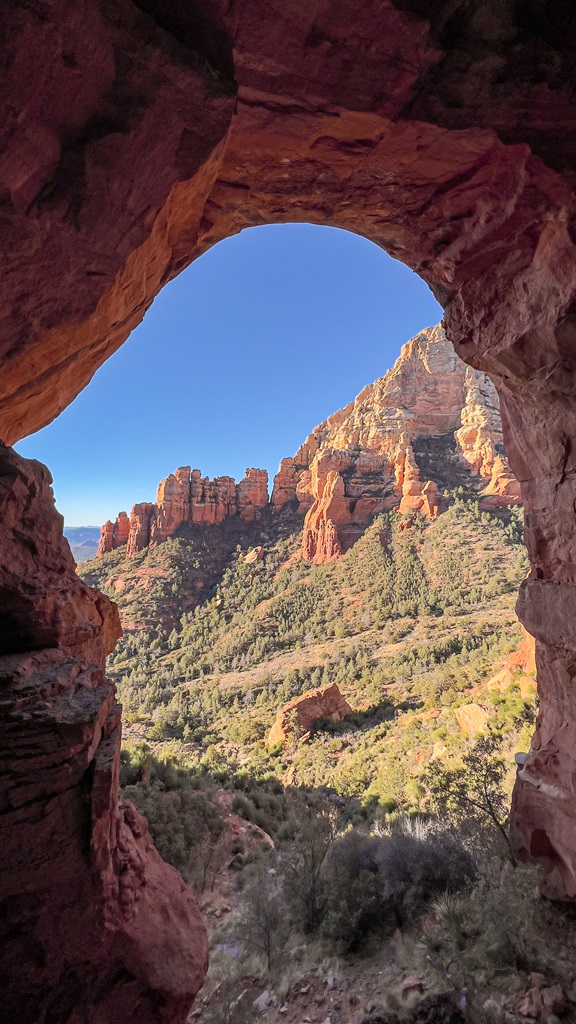 View of red rocks from inside the Keyhole Cave Sedona.