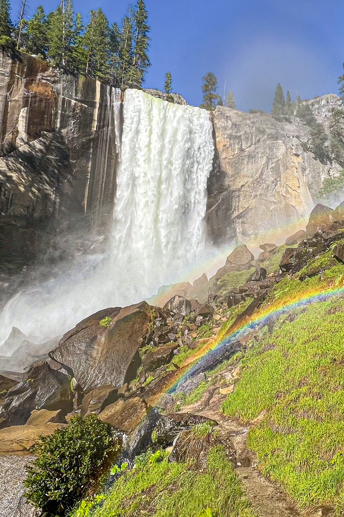 Vernal Fall during its peak flow with a double rainbow.