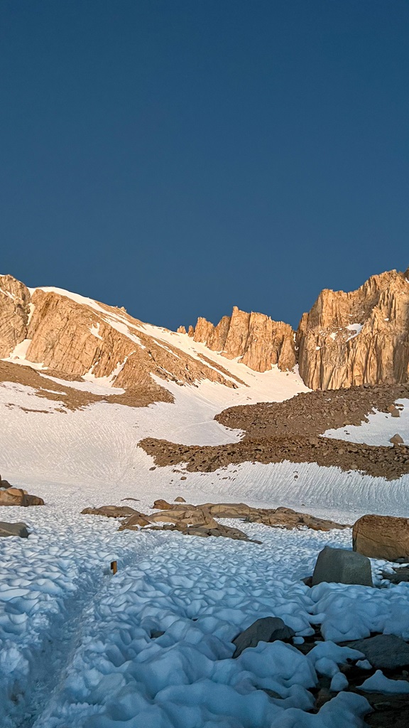 View of the steep, snowy chute leading to the top of Trail Crest from Trail Camp.