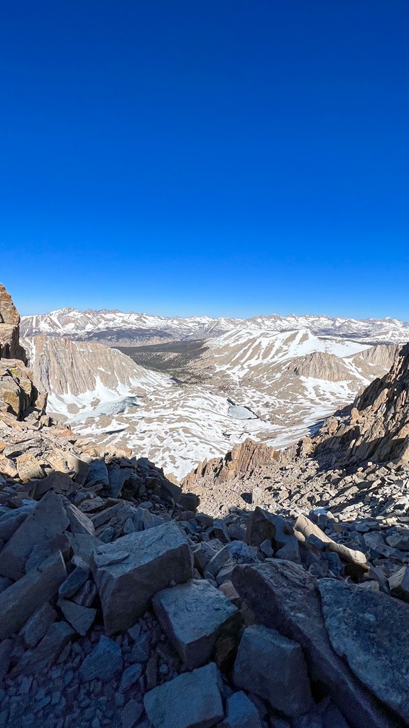 Incredible views from Trail Crest showing lots of snowy mountain peaks and alpine lakes.