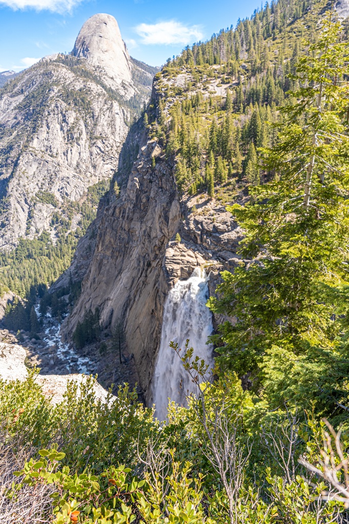 Small overlook of Illilouette Fall with Half Dome in the background in Yosemite National Park.