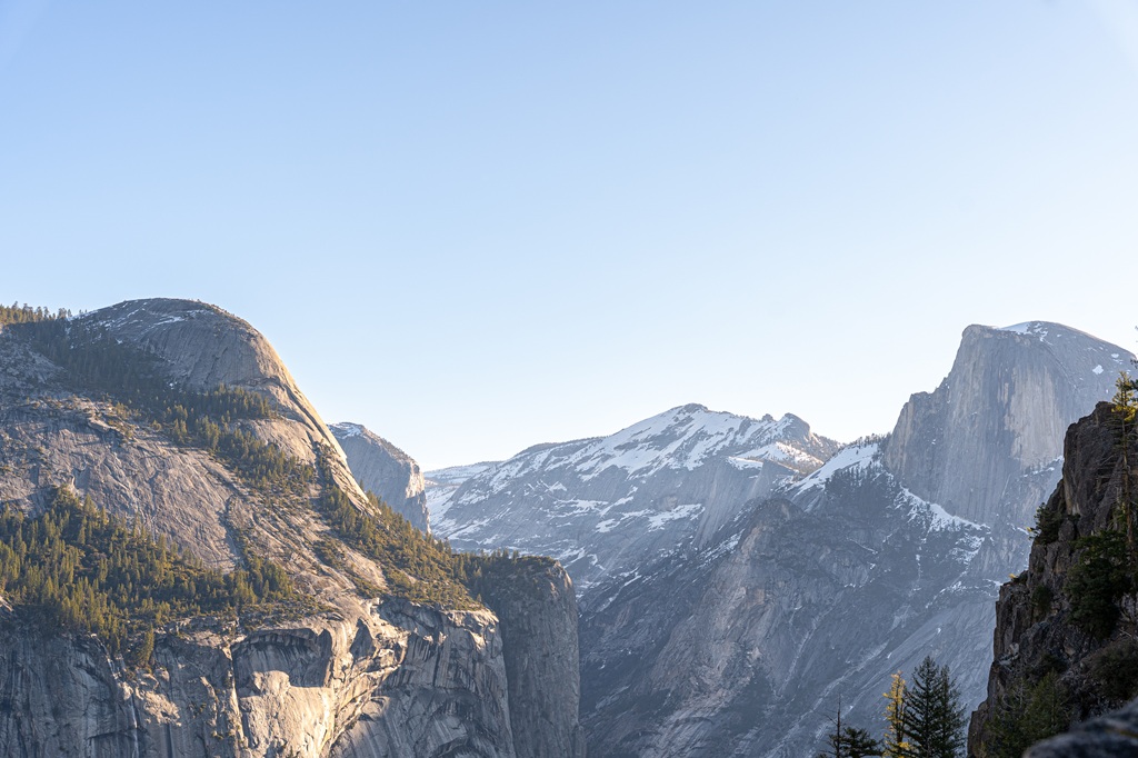 Views of North Dome, Clouds Rest, and Half Dome seen from Four Mile Trail in Yosemite National Park.
