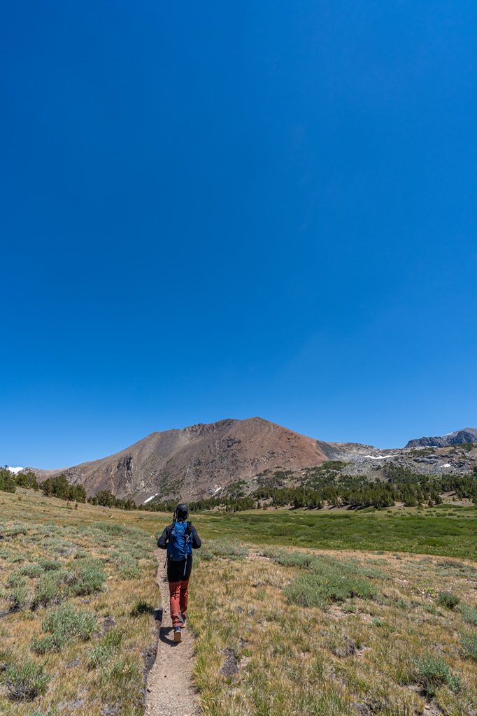 Man hiking the Mono Pass Trail in Yosemite National Park.