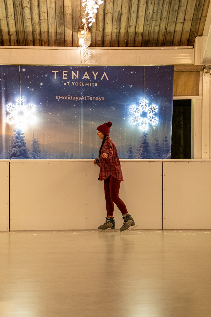 Woman ice skating at Tenaya Lodge in winter.