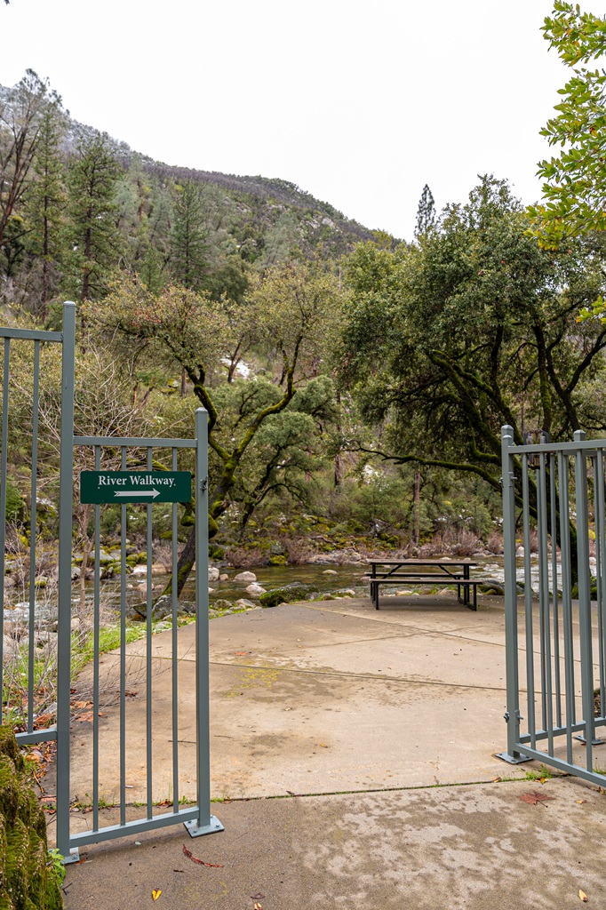 Open gate leading to the River Walkway at Yosemite View Lodge.