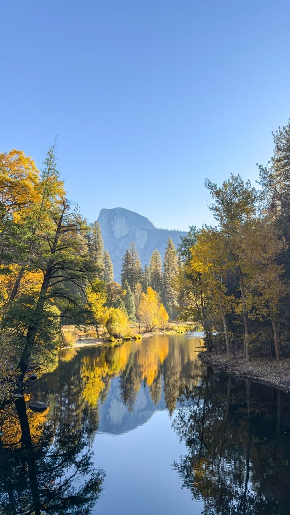 View of Half Dome and Merced River from Sentinel Bridge in Yosemite National Park in mid-fall.