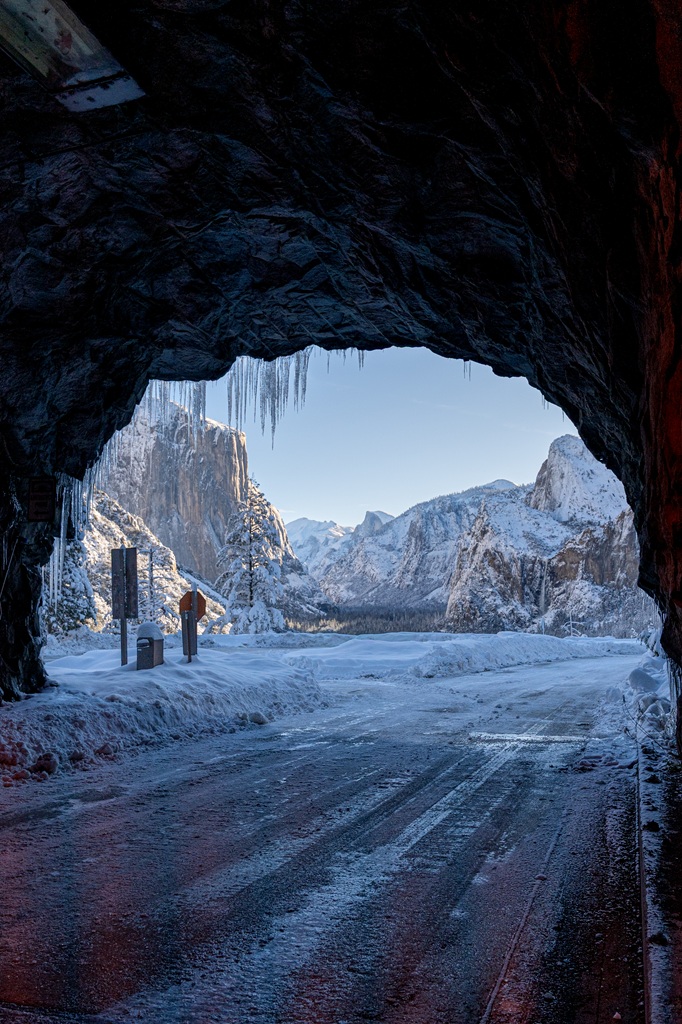 Standing inside Wawona Tunnel looking at Tunnel View in Yosemite National Park in mid-winter.