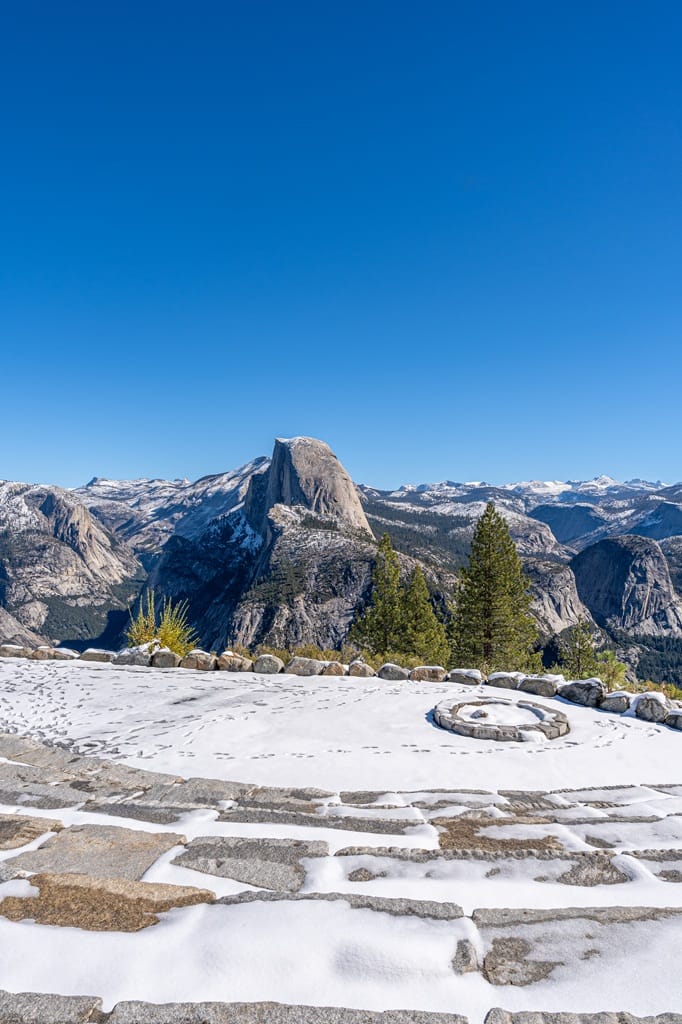 View of Glacier Point amphitheater covered in snow in Yosemite National Park.